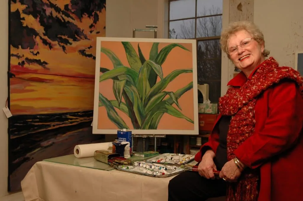 Art gallery visitor viewing contemporary abstract swirl pattern exhibitions